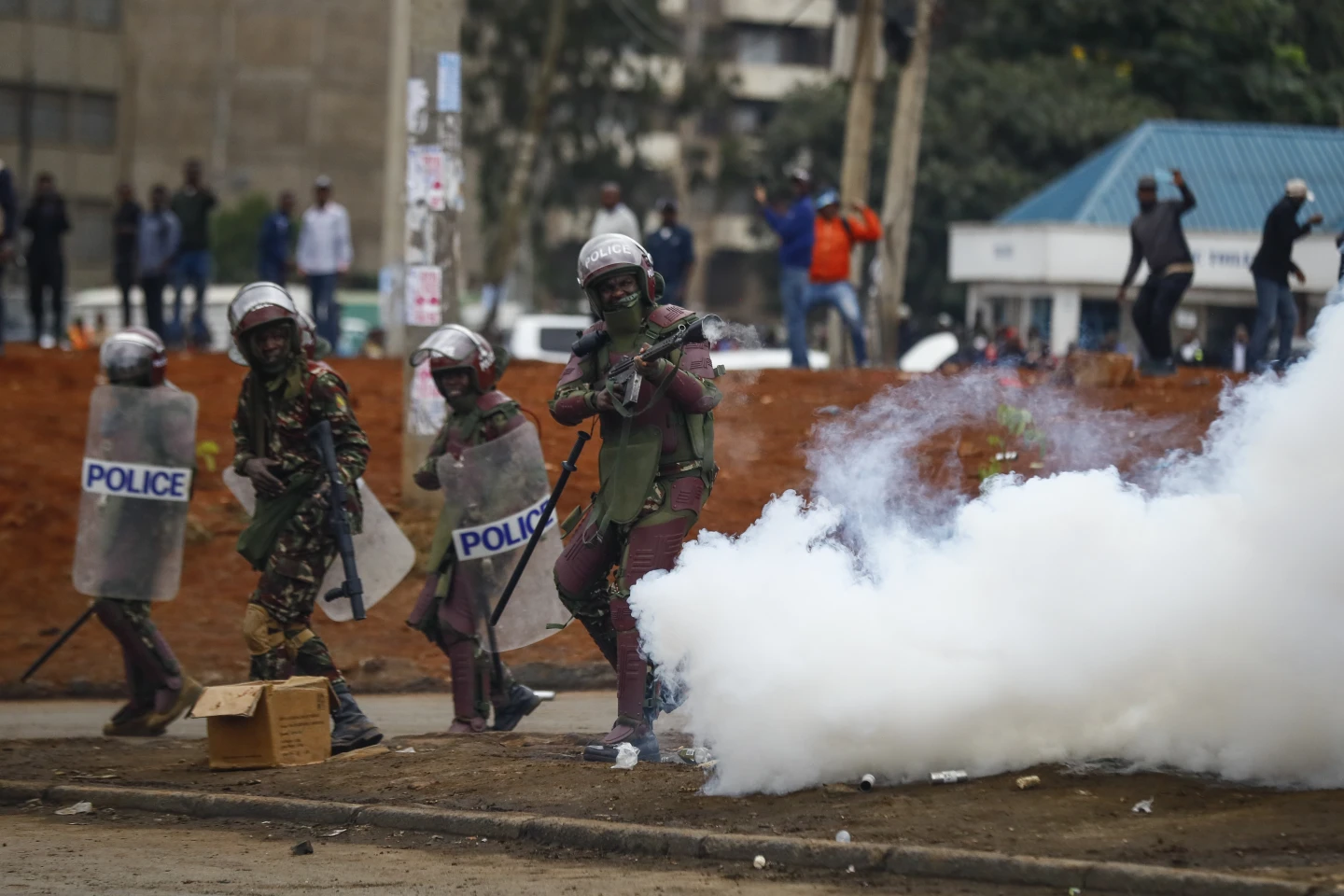 Activists in Kenya burn tires and block roads to protest taxes. Police detain more than 20 people