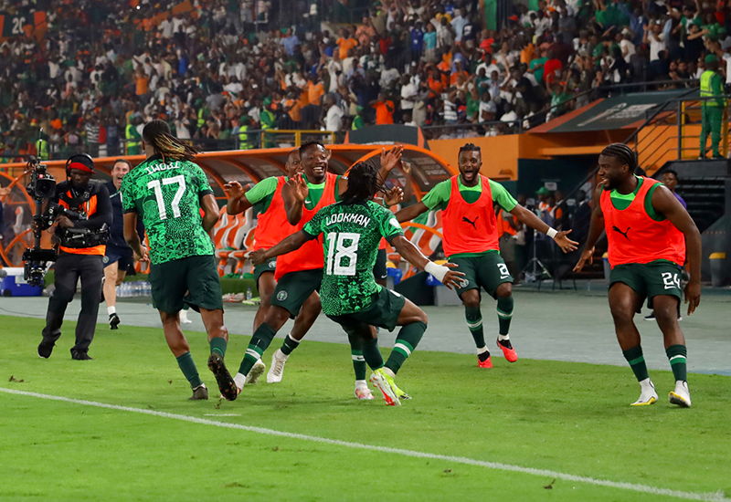 Nigeria win classic over Cameroon to reach quarter-finals