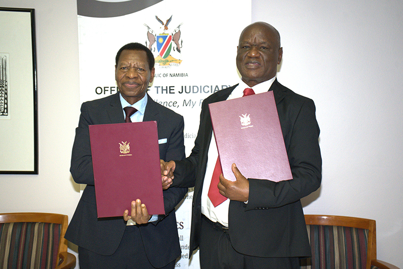Chief justice Peter Shivute and his Zimbabwean counterpart, Luke Malaba