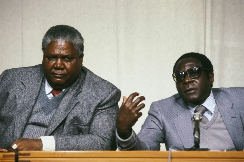 Liberation leaders Joshua Nkomo (L) and Robert Mugabe (R) photographed weeks before Zimbabwe's independence in 1980