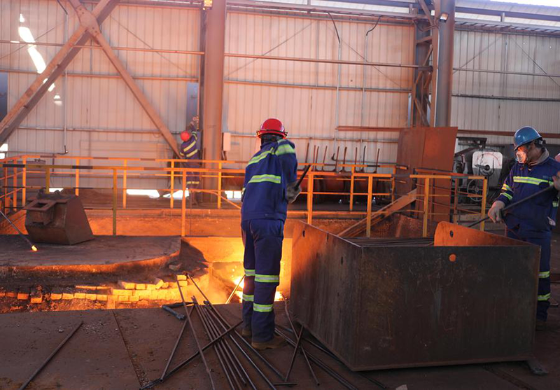 Workers are busy at the Dinson Iron and Steel Company (DISCO) in Manhize, Midlands Province