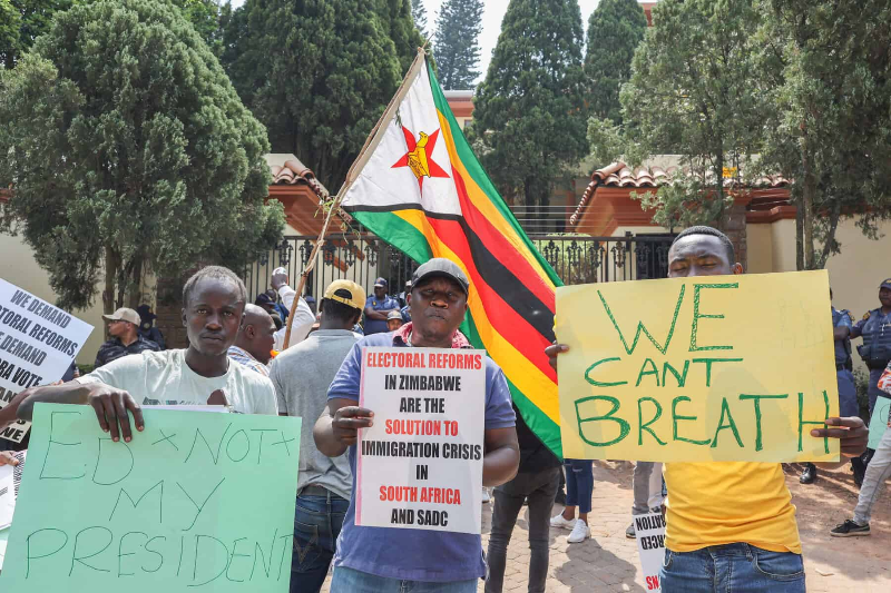 Protesters at the Zimbabwean Embassy in Johannesburg