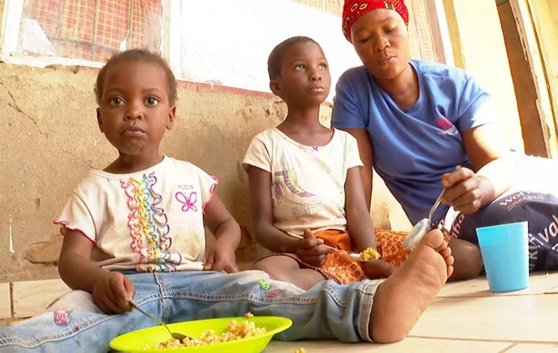 Tambudzai Mahachi normally supplies markets in Harare with food - now she struggles to feed her own children