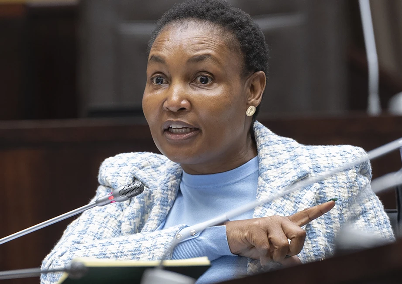 South Africa’s justice minister denies corruption allegations against her in a mutual bank scandal