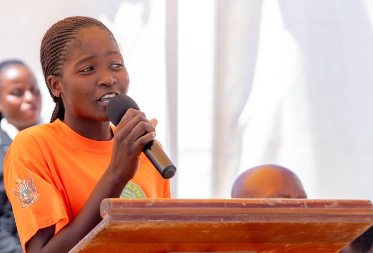 Olivia Nyangasi shares her story at the launch of the “Not in my Village” campaign