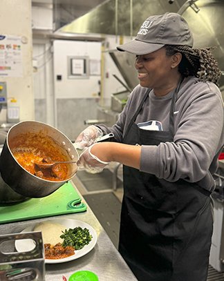 Rumbidzai “Rumbi” Kangira-Mate cooking Zimbabwean cuisine as part of the Cooking from Home programme