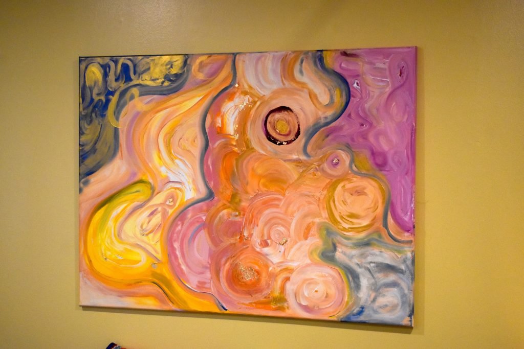 One of Shayna Oosthuysen’s expressive, abstract creations hangs in her living room in Rifle