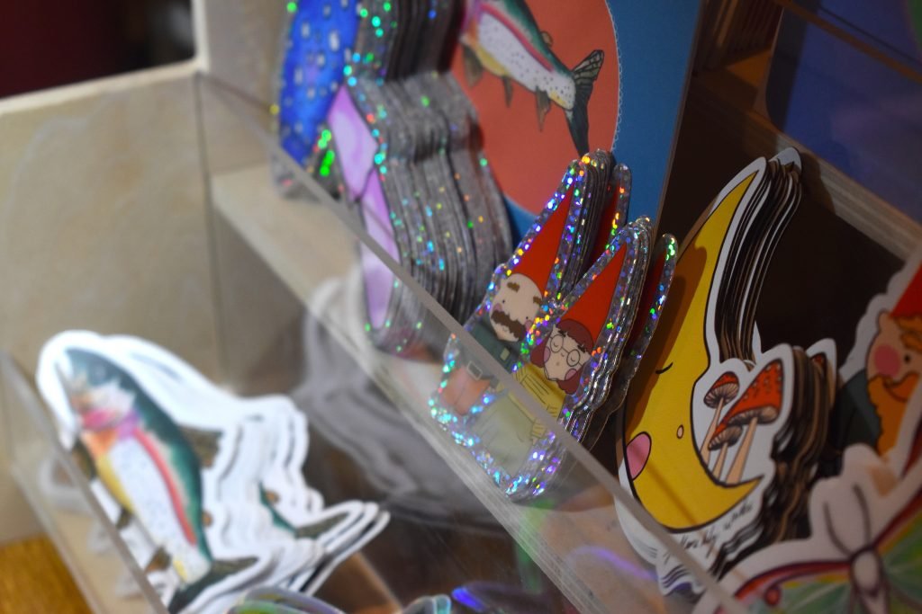 Artist Shayna Oosthuysen created stickers from an illustration of her and her fiancé, David Mowery, (inventor of the Pack Chair) as gnomes