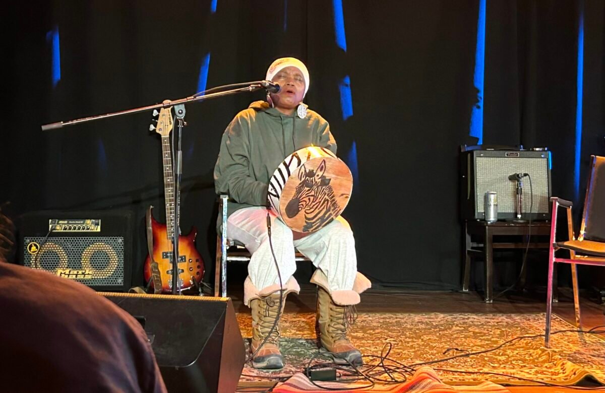 Francisca Mandeya plays the mbira, a traditional instrument from Zimbabwe, on the stage of Jam Café in Iqaluit on Nov. 7.