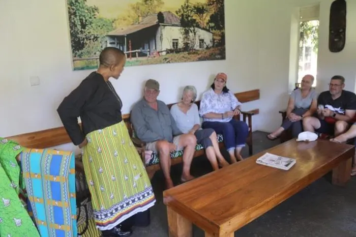 ourism and Hospitality Industry Minister Barbara Rwodzi with South African traveller and influencer George Van Deventer, his partner Malinki, members of the South African touring group and officials from the Zimbabwe Tourism Authority during a meeting in Chimanimani aimed at resolving a police roadblock incident and restoring confidence among visiting tourists.