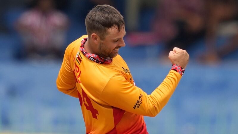 Zimbabwe's Ryan Burl celebrates the wicket of Australia's Glenn Maxwell