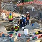 Death toll in South African building collapse rises to 9 as city plans demolition