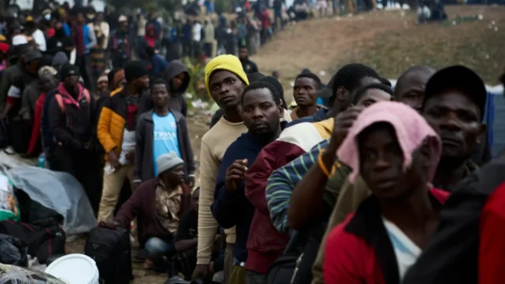 Migrants clash with police at a deportation site in South Africa where thousands have gathered